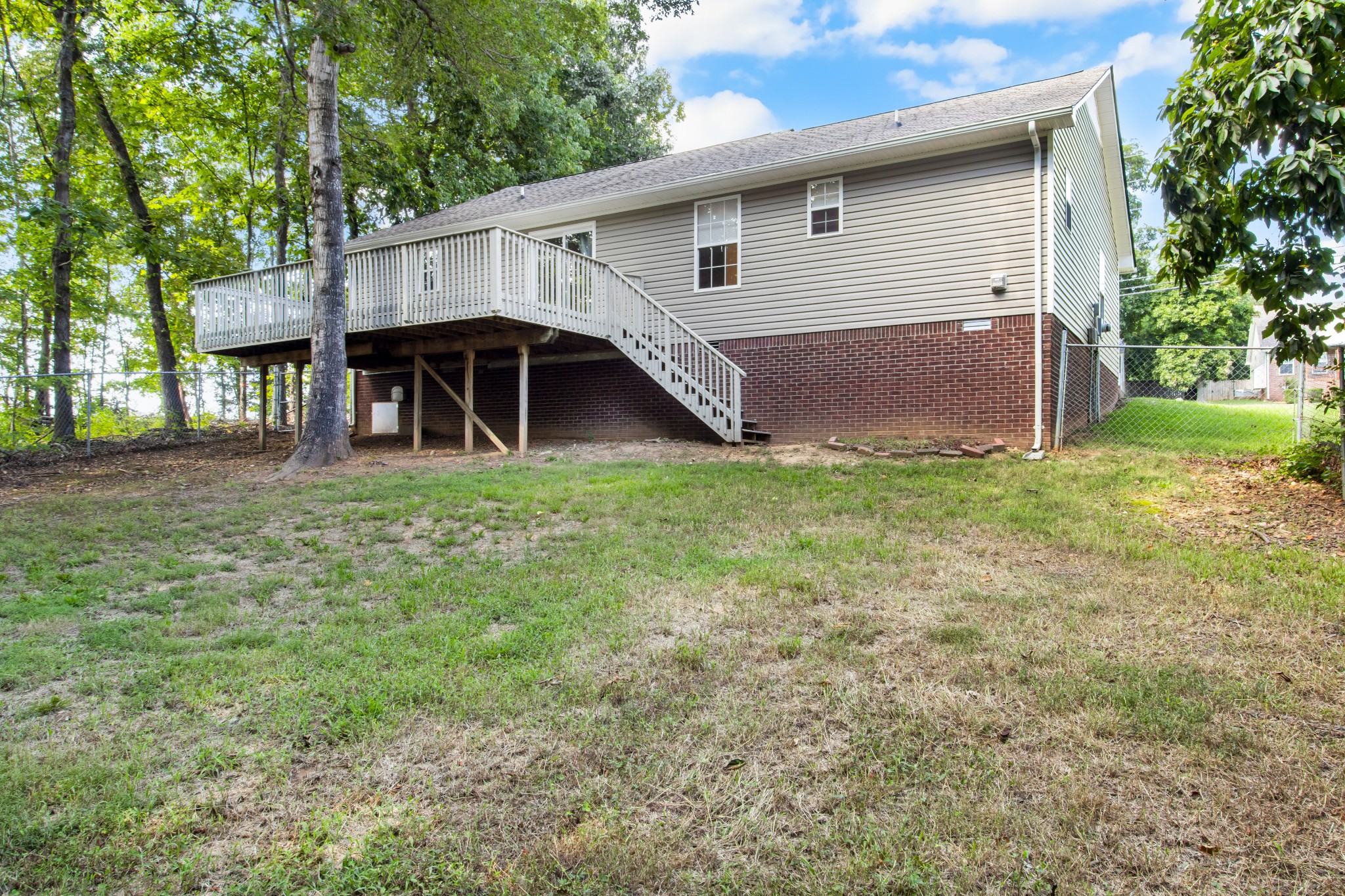 1760 Hazelwood Road Clarksville, TN 37040 - Photo 33 of 34 a view of a house with a yard
