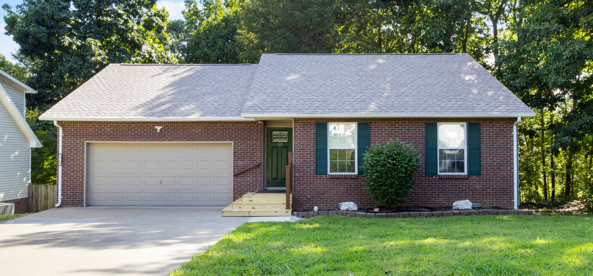1760 Hazelwood Road Clarksville, TN 37040 - Photo 5 of 34 front view of a house with a yard