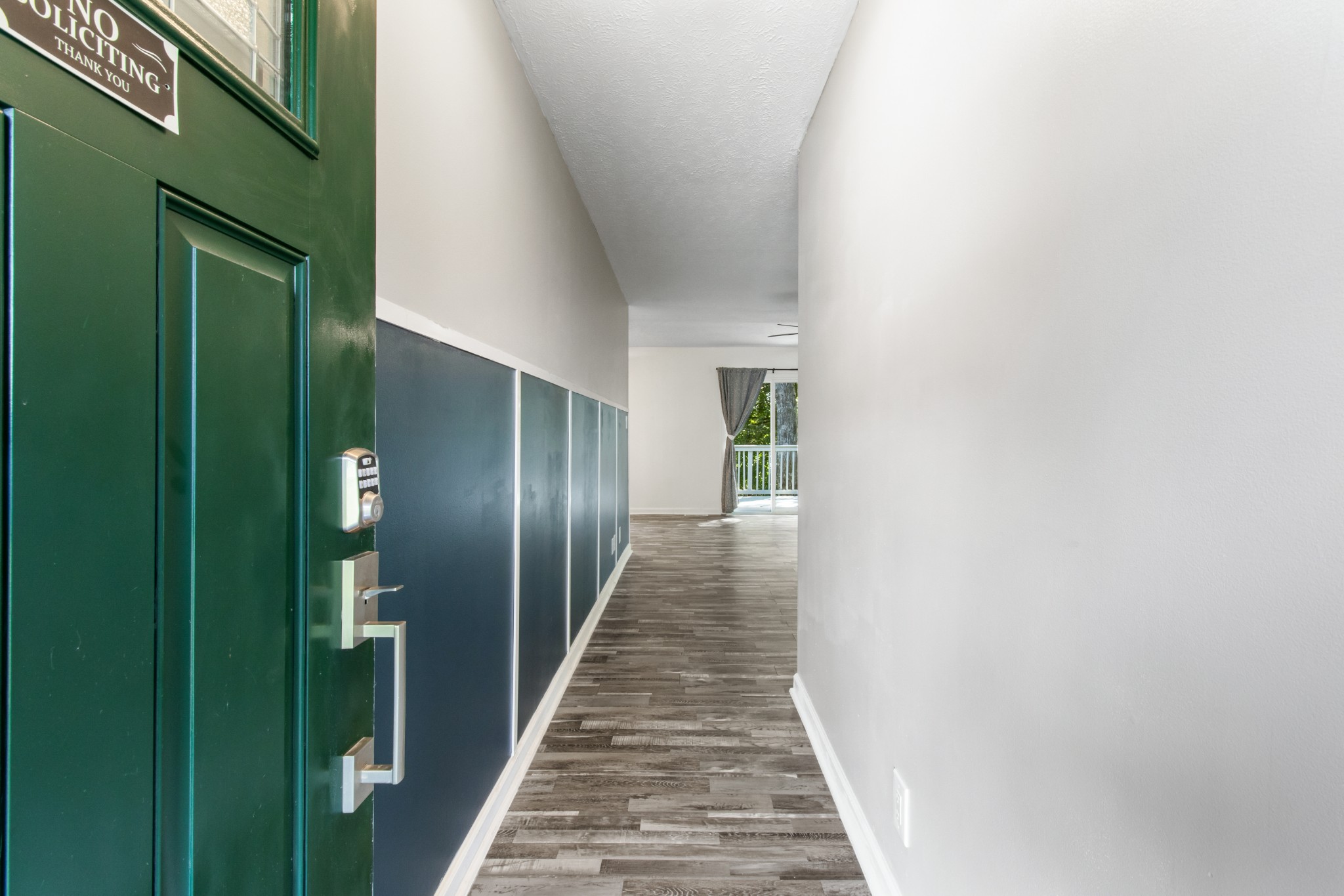 1760 Hazelwood Road Clarksville, TN 37040 - Photo 8 of 34 a hallway with wooden floor and stairs