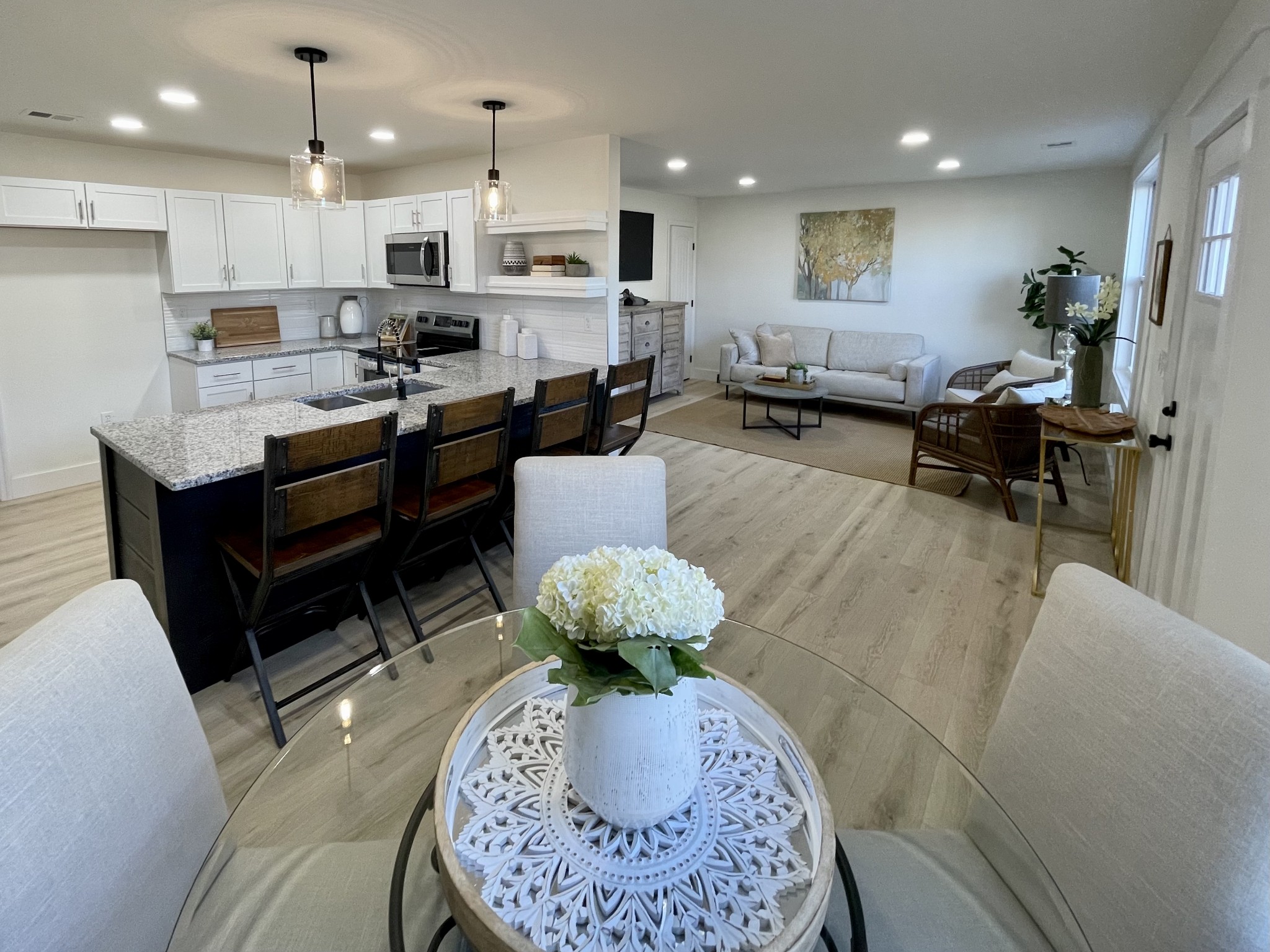 1056 Cheyenne Boulevard Madison, TN 37115 - Photo 2 of 11 a living room with furniture and kitchen view