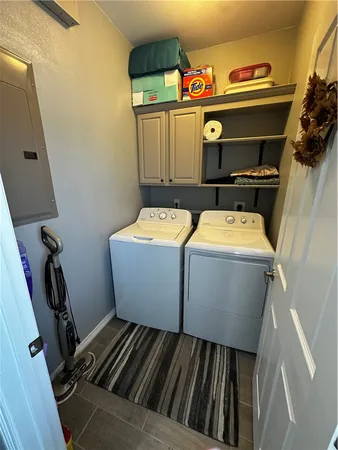 a room with gym equipment and a large window