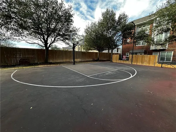 a view of a house with swimming pool and sitting area