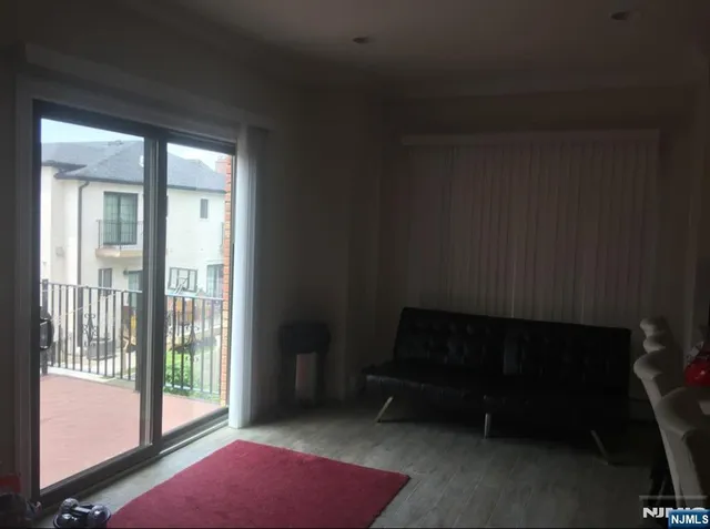 a room with furniture and a window