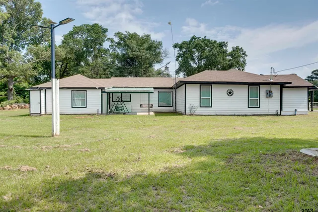 a house with a garden in front of it
