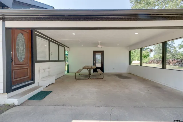 a view of a hallway with entryway