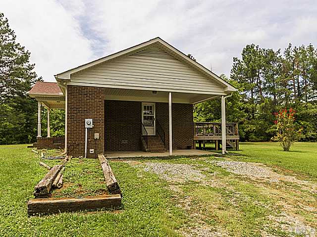 1460 Miles Chapel Road Mebane, NC 27302 - Photo 2 of 25 Side of Home/ Carport