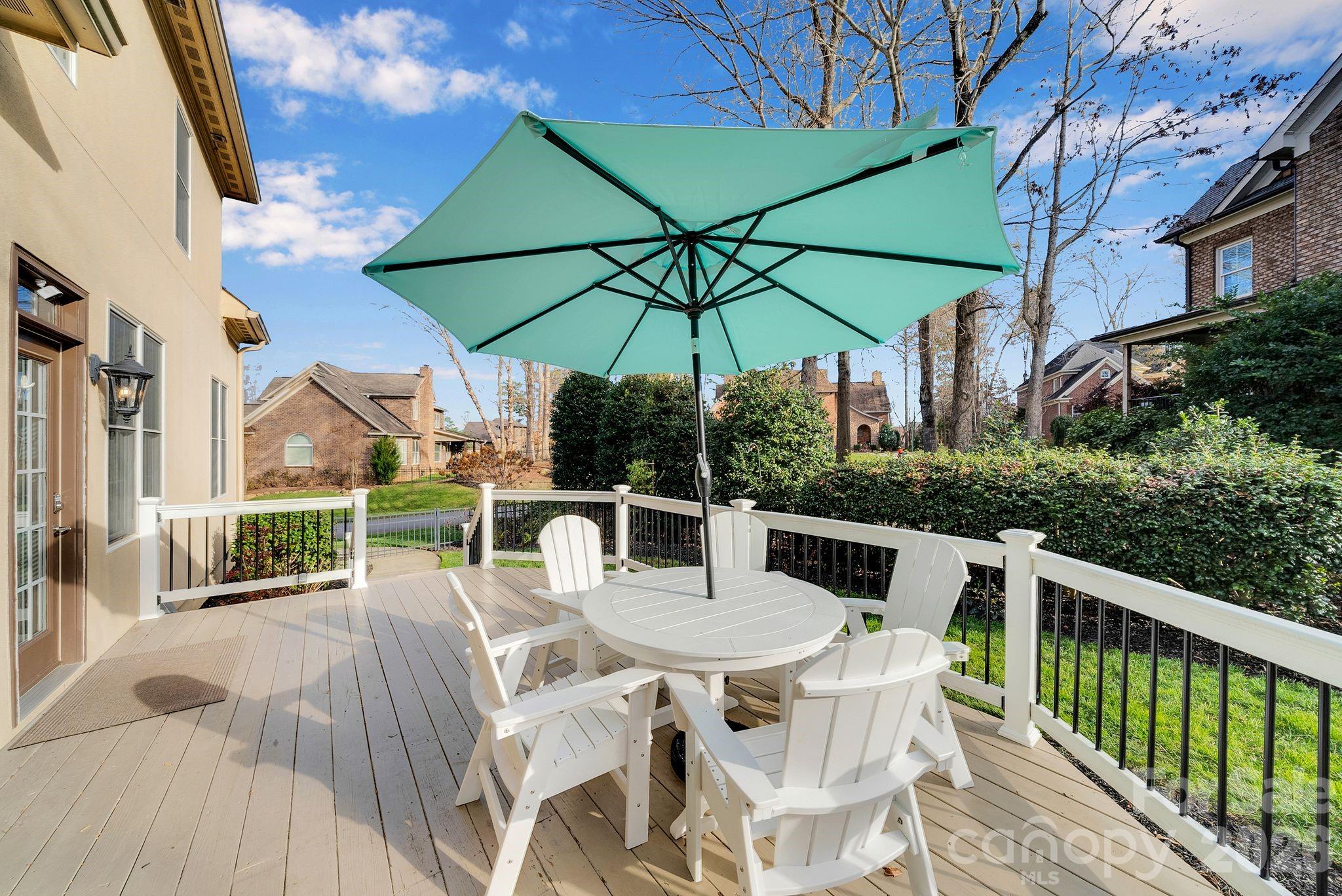 7778 Burning Ridge Drive Stanley, NC 28164 - Photo 42 of 48 a view of a patio with a table chairs and a table