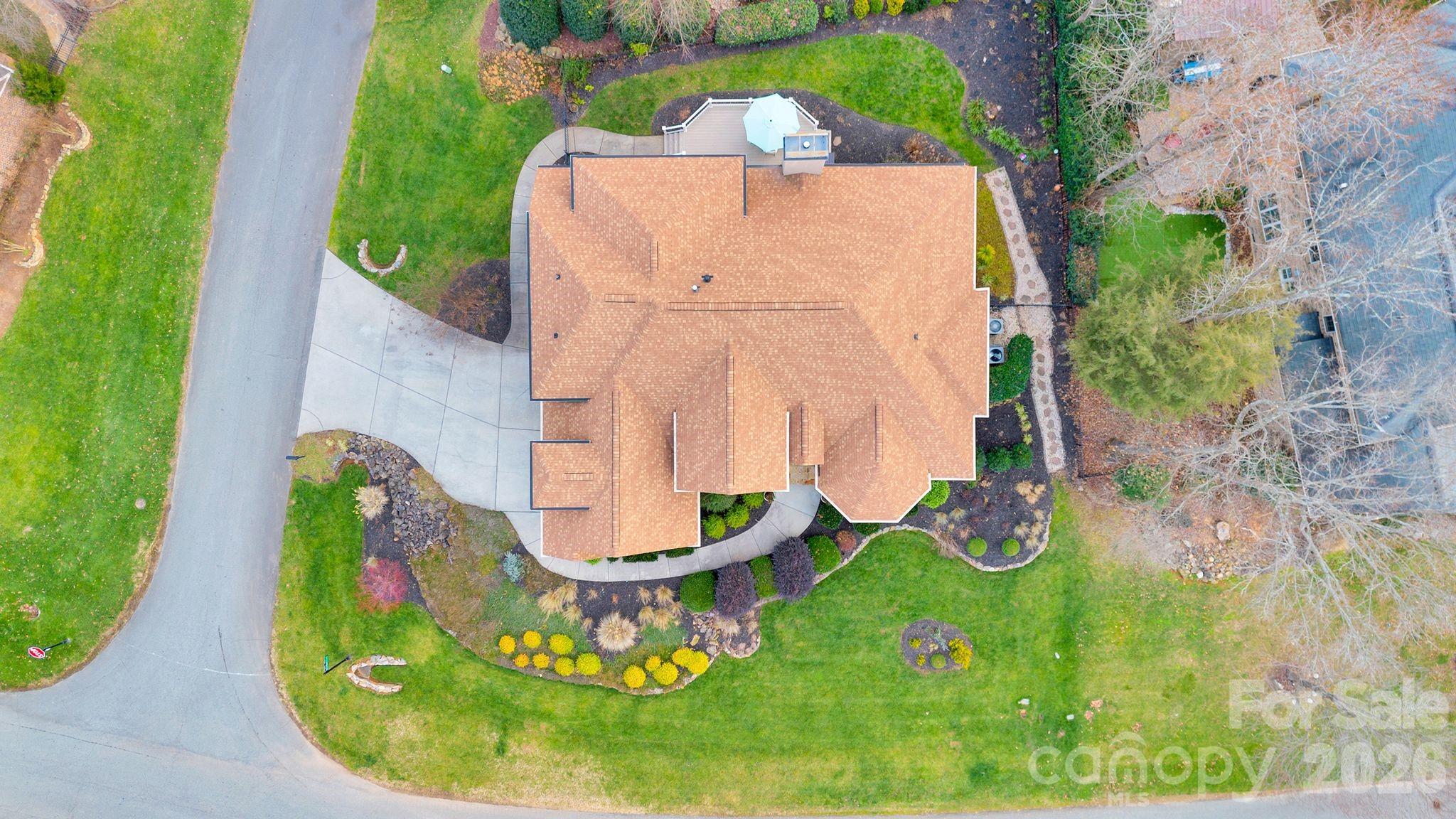 7778 Burning Ridge Drive Stanley, NC 28164 - Photo 43 of 48 an aerial view of a house having yard
