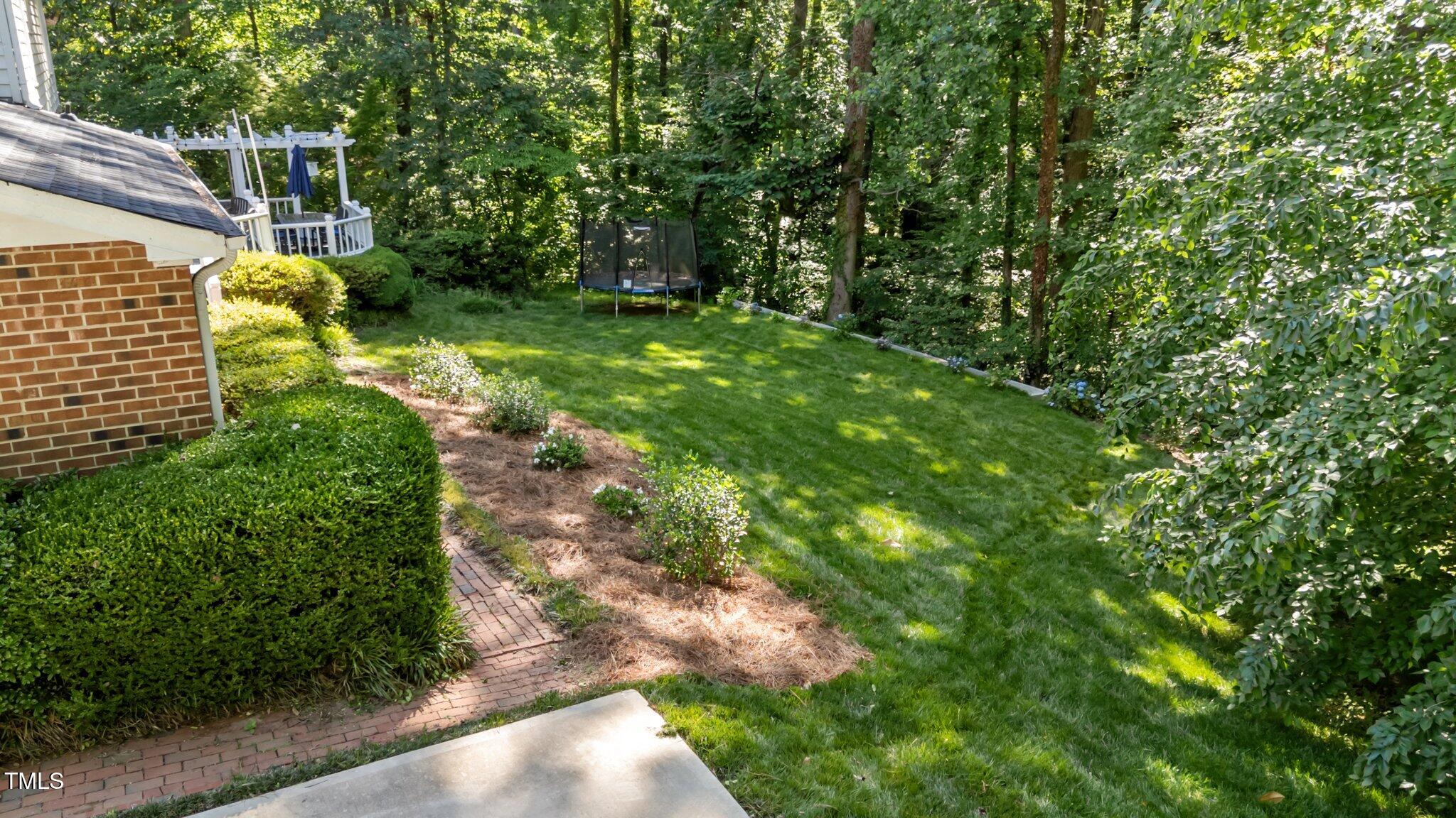 2409 Beechview Court Raleigh, NC 27615 - Photo 34 of 46 a view of yard with green space