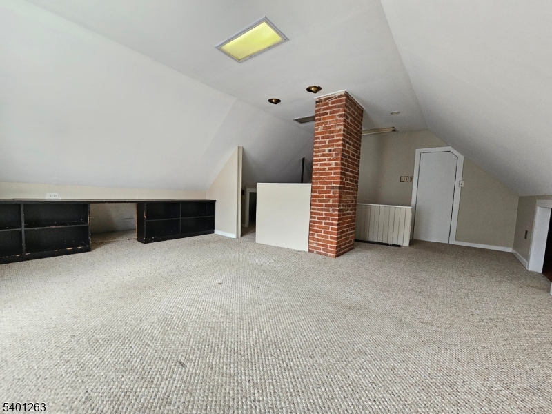 232 Morris Avenue Summit, NJ 07901 - Photo 12 of 13 a view of an empty room with a stairs