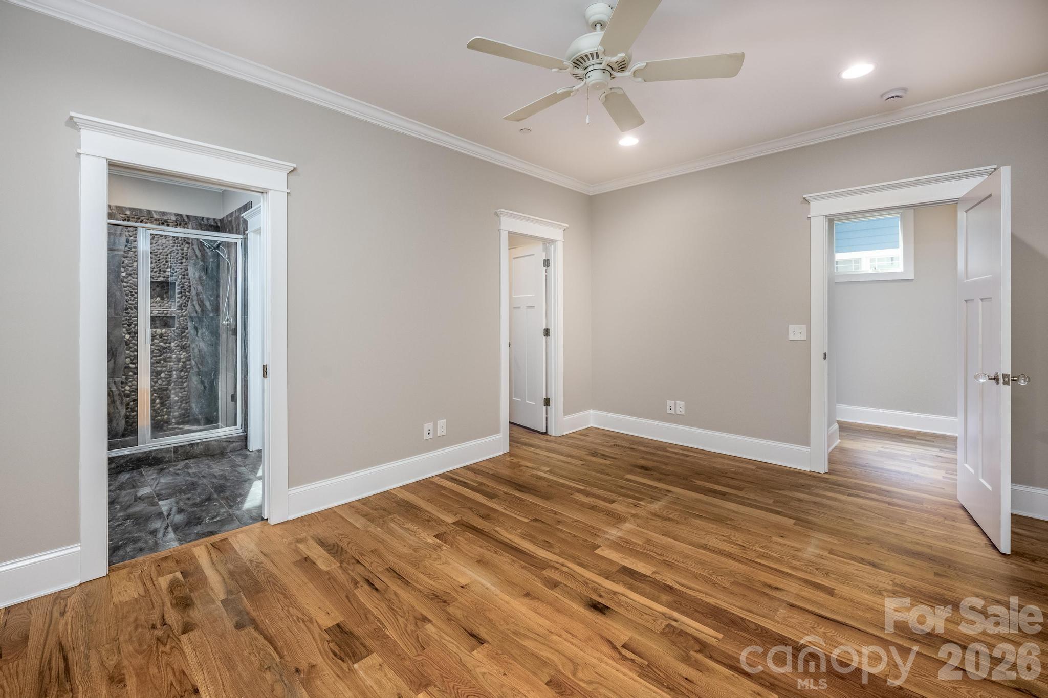 735 Emma Claire Lane Davidson, NC 28036 - Photo 18 of 48 a view of empty room with wooden floor