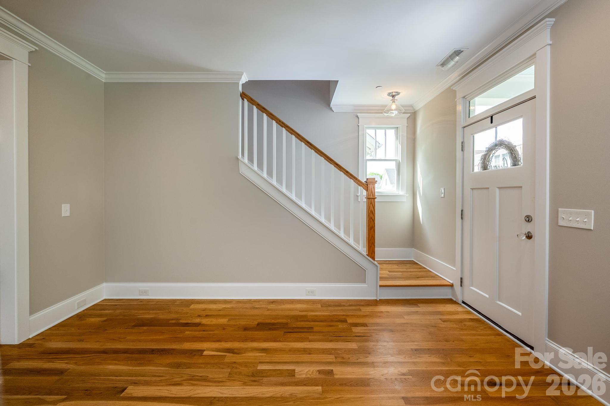 735 Emma Claire Lane Davidson, NC 28036 - Photo 21 of 48 a view of an entryway with wooden floor
