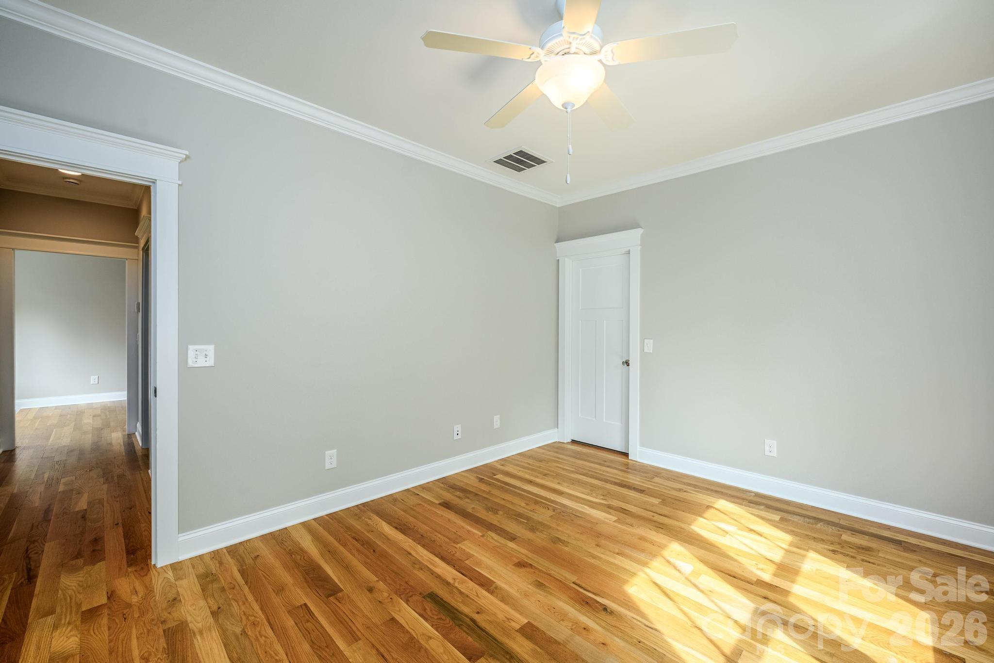 735 Emma Claire Lane Davidson, NC 28036 - Photo 28 of 48 a view of empty room with wooden floor