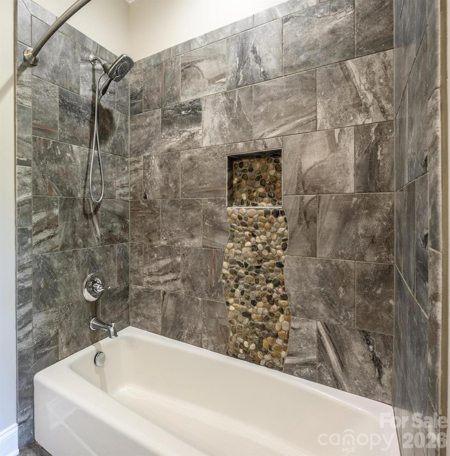 735 Emma Claire Lane Davidson, NC 28036 - Photo 30 of 48 a bathroom with a bathtub