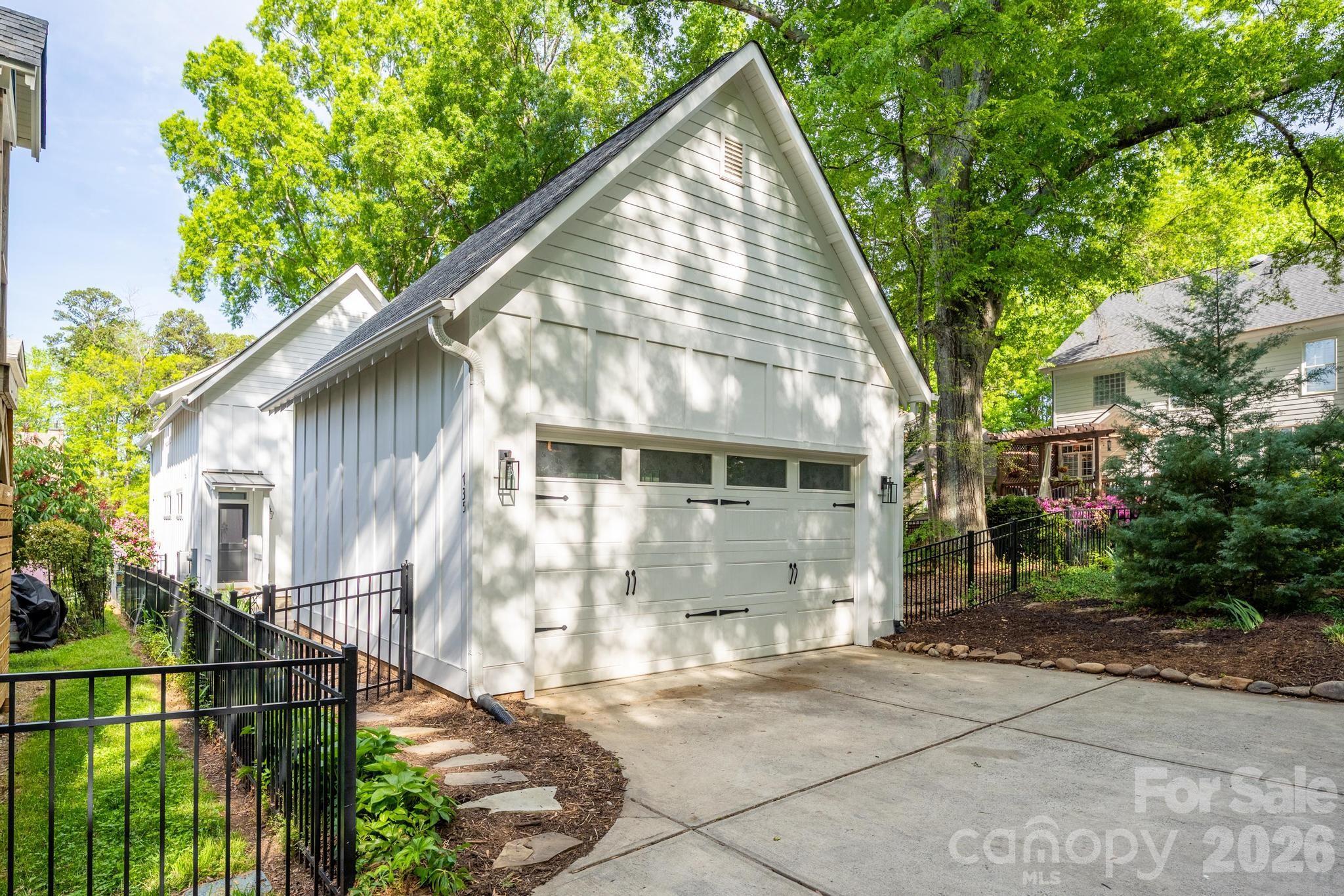 735 Emma Claire Lane Davidson, NC 28036 - Photo 36 of 48 a view of a house with a yard
