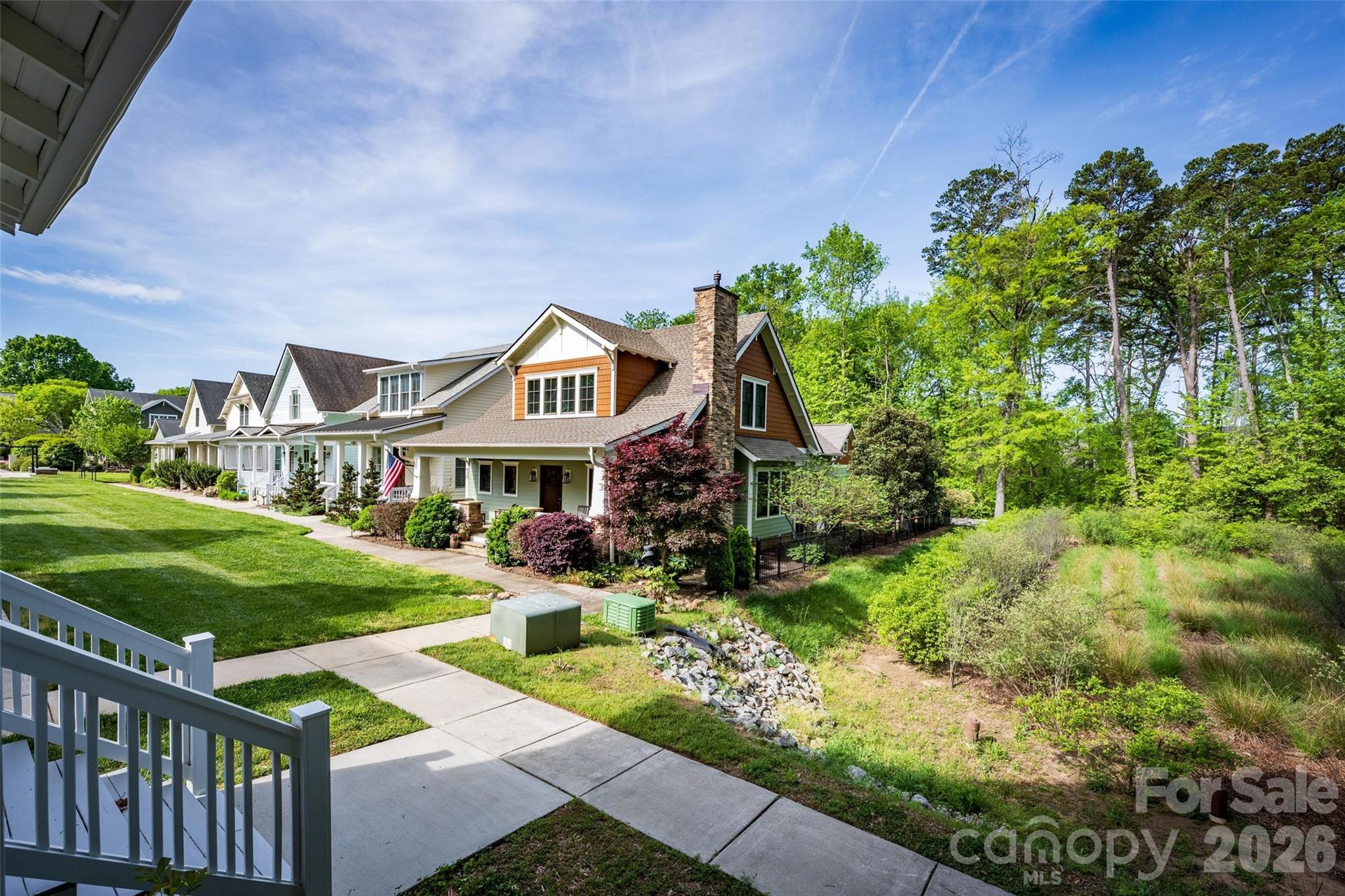 735 Emma Claire Lane Davidson, NC 28036 - Photo 38 of 48 a front view of a house with garden