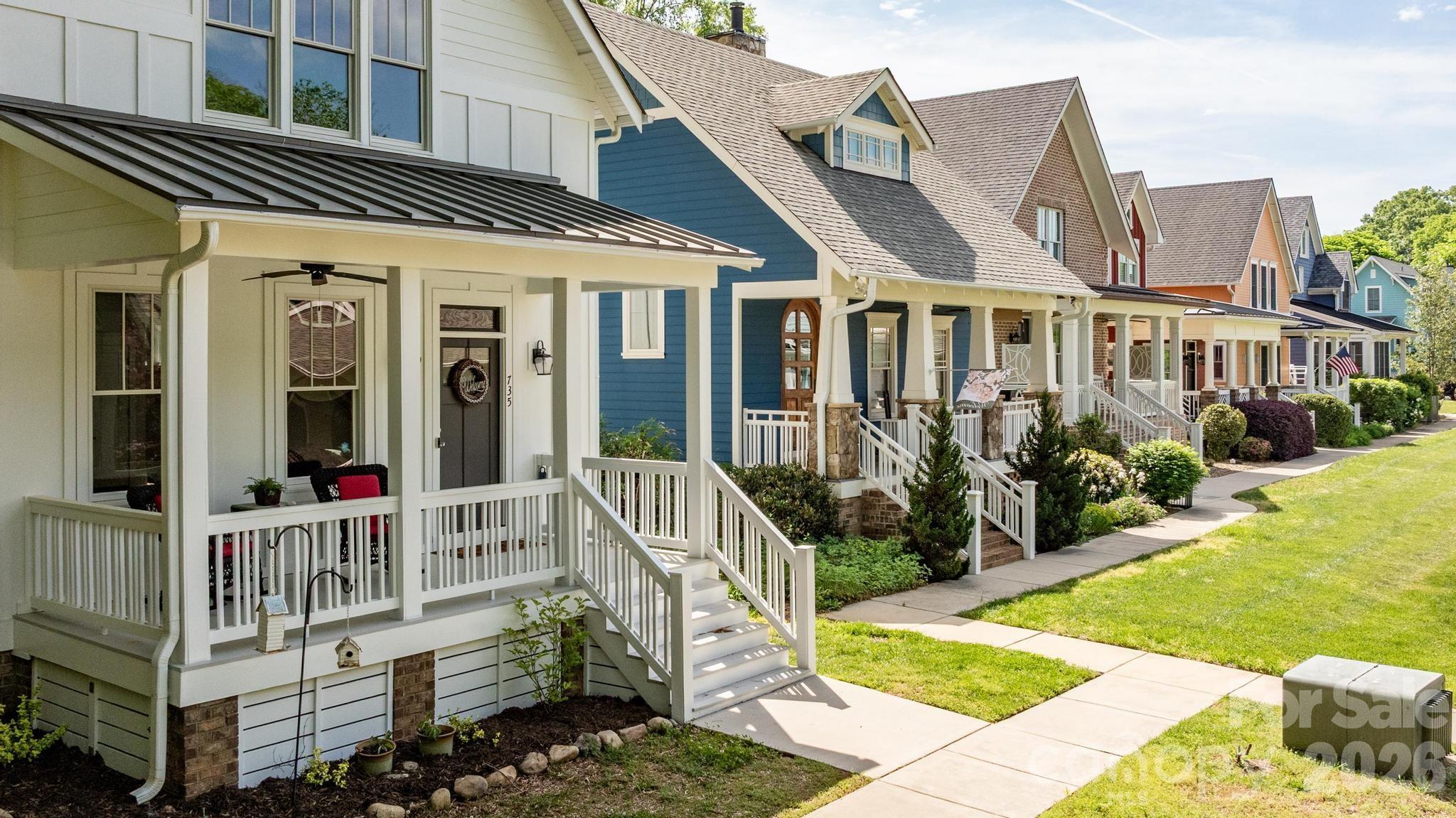 735 Emma Claire Lane Davidson, NC 28036 - Photo 39 of 48 a view of a house with backyard and porch