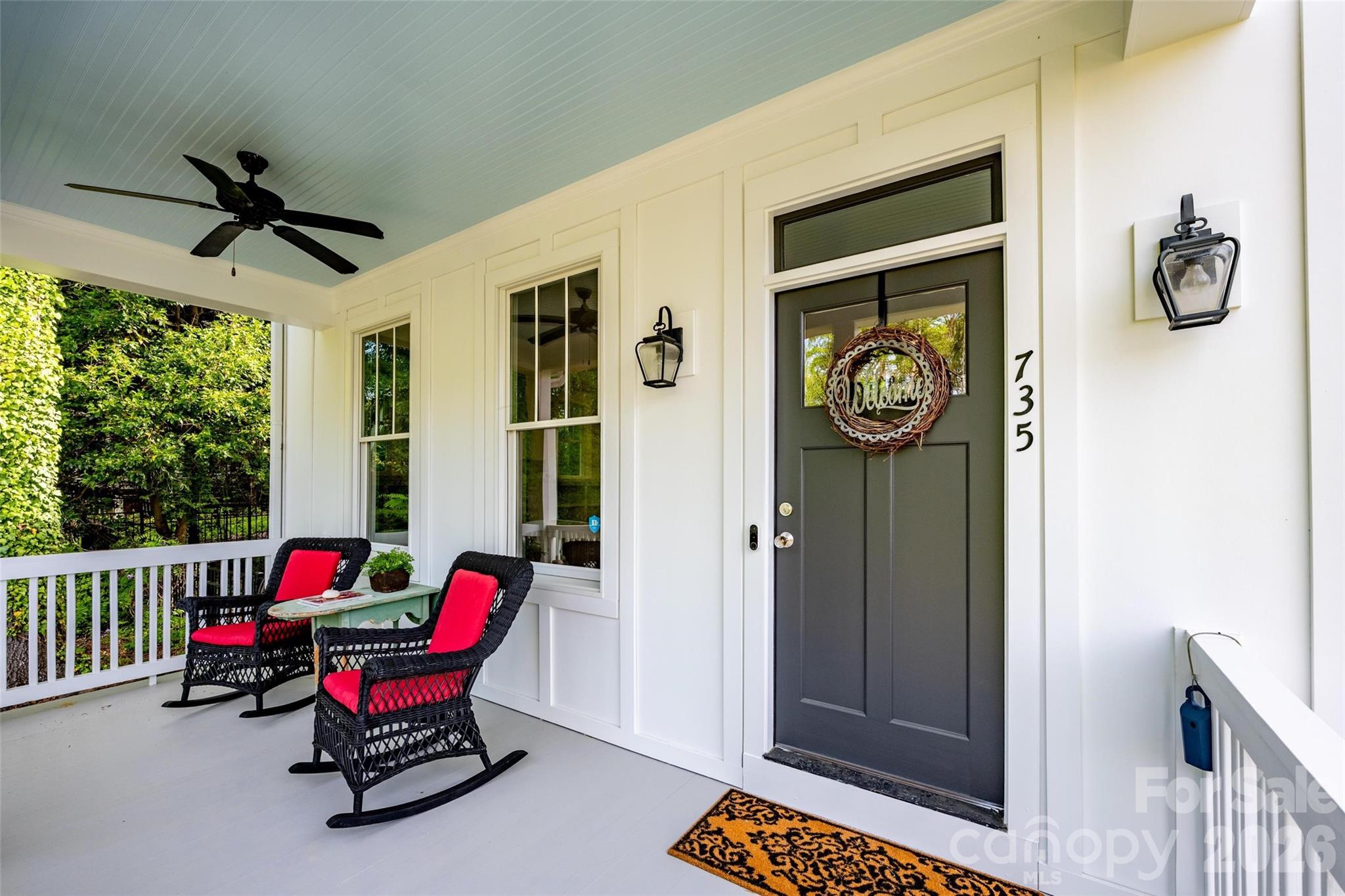 735 Emma Claire Lane Davidson, NC 28036 - Photo 4 of 48 a living room with furniture and a window