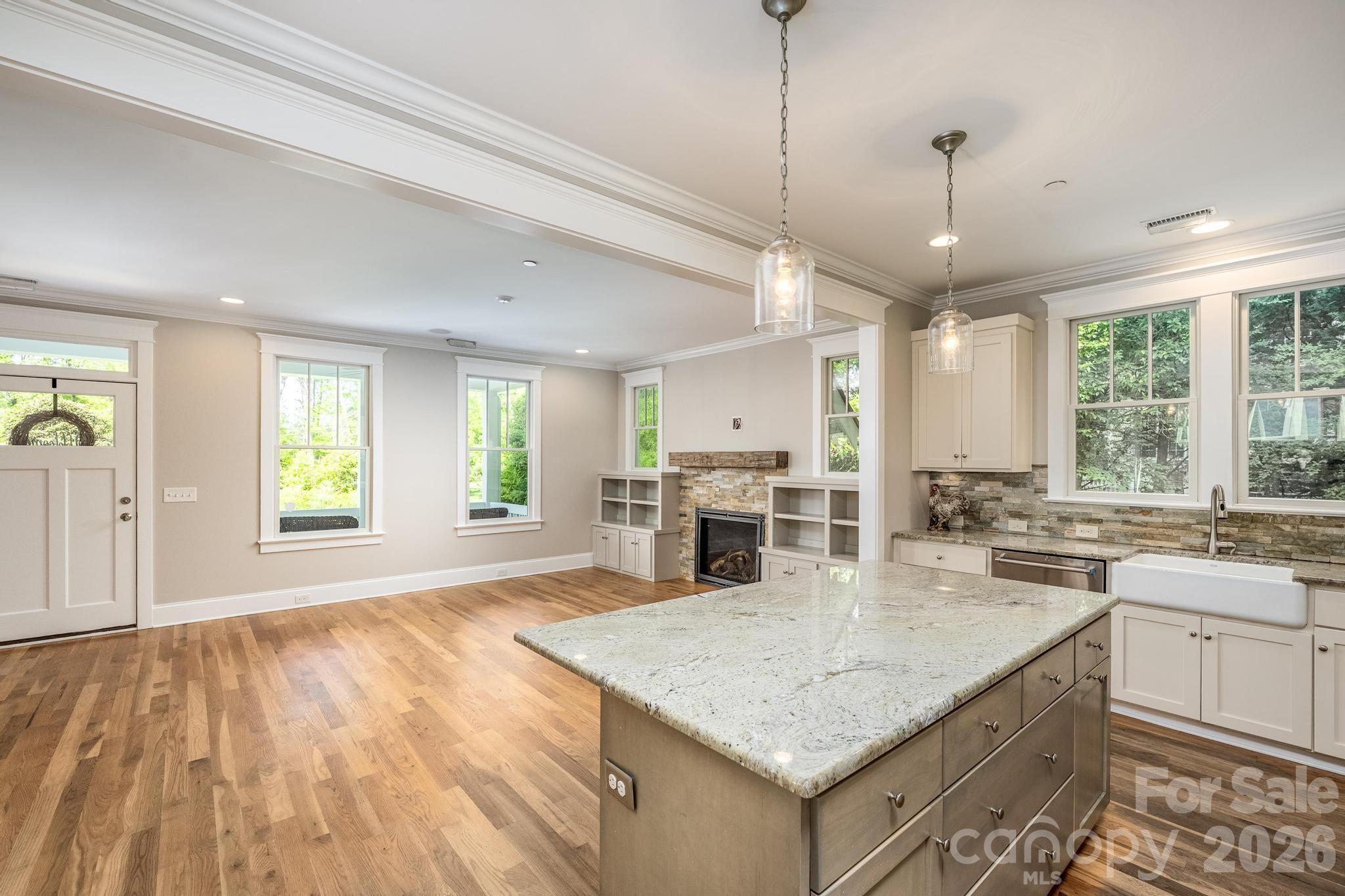 735 Emma Claire Lane Davidson, NC 28036 - Photo 9 of 48 a kitchen with sink stove and refrigerator