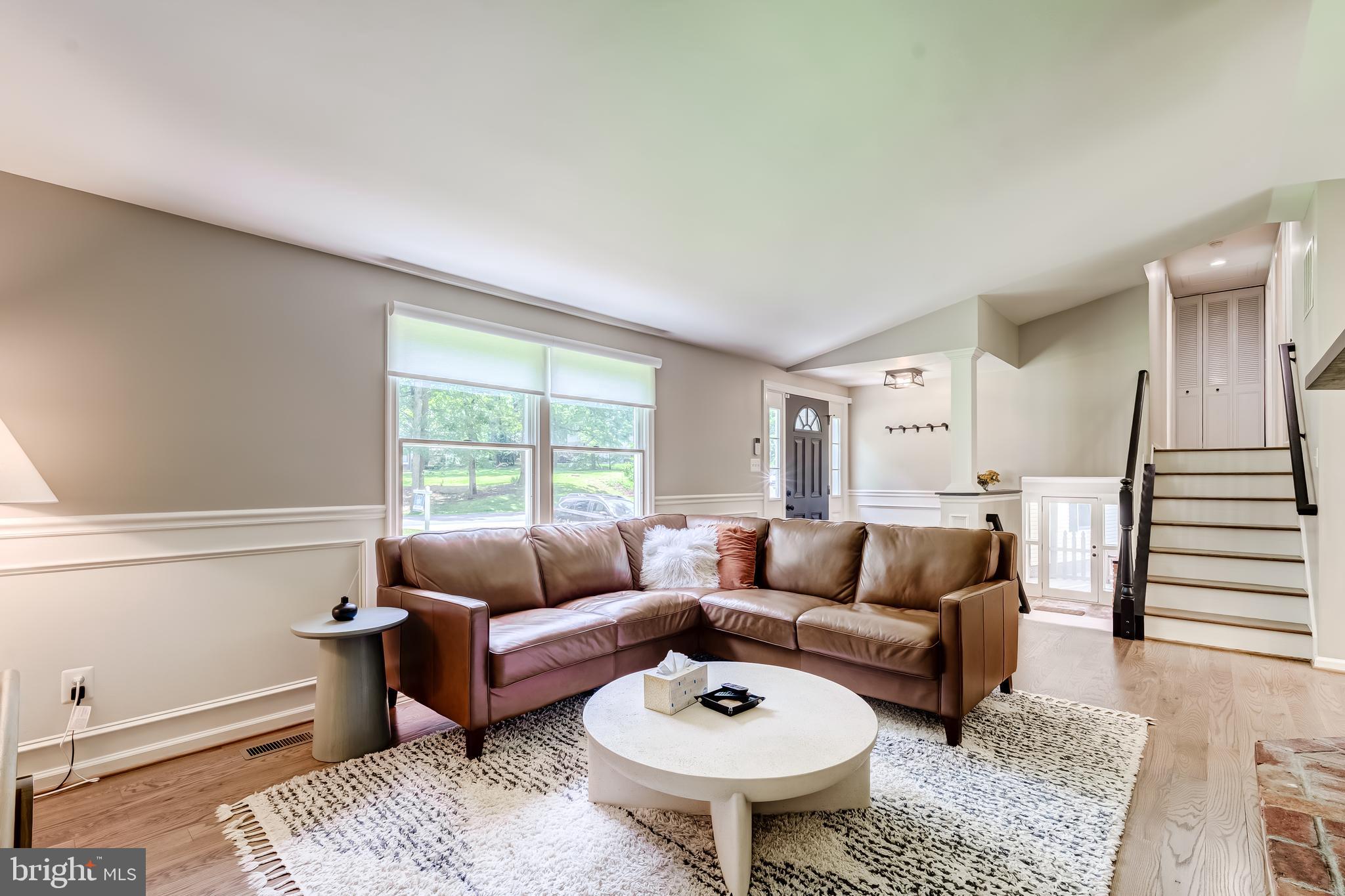 11926 Appling Valley Road Fairfax, VA 22030 - Photo 17 of 60 a living room with furniture and a rug