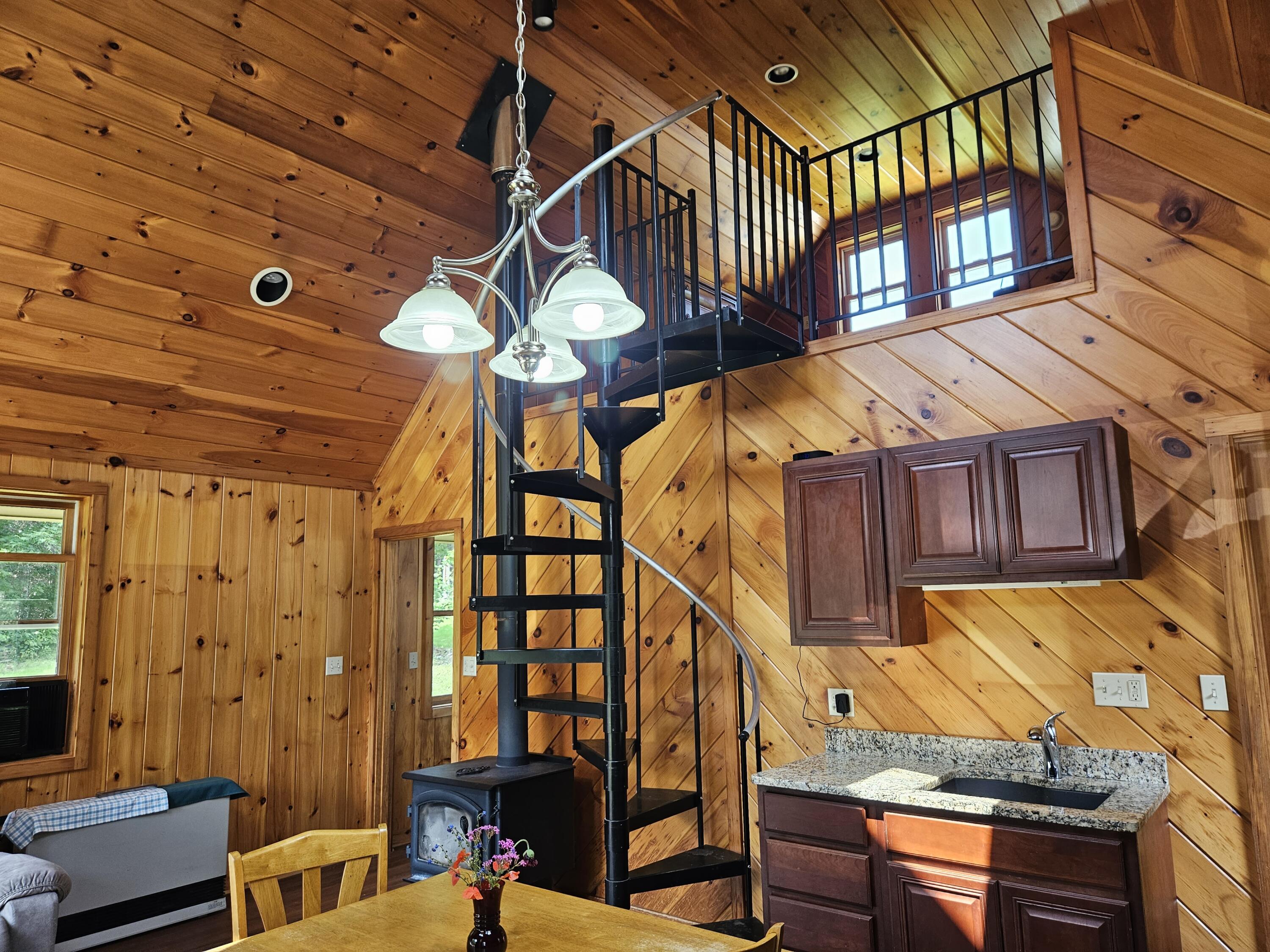 34 N Road Shirley Mills, ME 04485 - Photo 16 of 47 Looking up to loft
