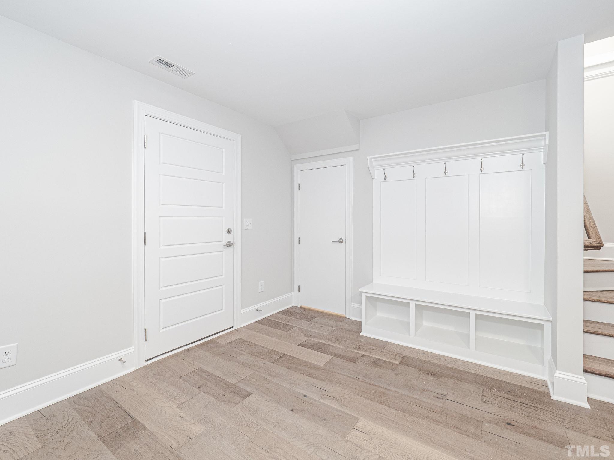 4920 Trek Lane Raleigh, NC 27606 - Photo 26 of 31 an empty room with wooden floor