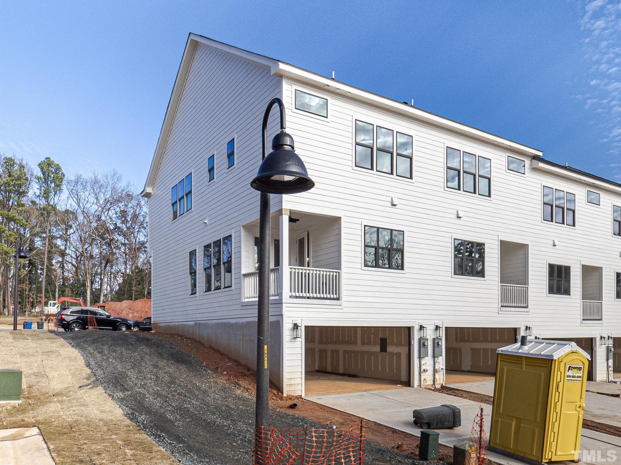 4920 Trek Lane Raleigh, NC 27606 - Photo 5 of 31 a front view of a house with parking space