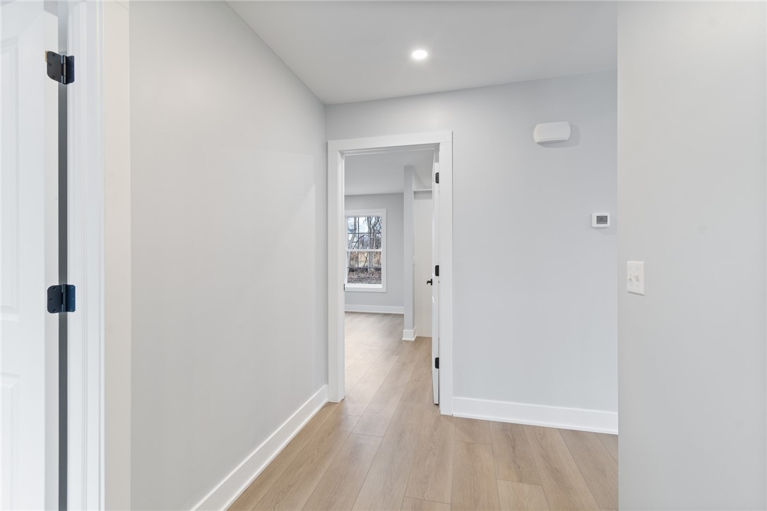 4034 Rasmussen Street Williamson, NY 14589 - Photo 12 of 27 This home has HEATED FLOORS! Even in the insulated