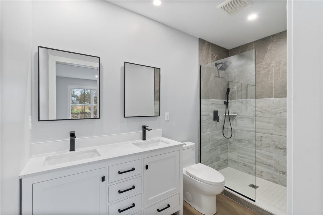 4034 Rasmussen Street Williamson, NY 14589 - Photo 15 of 27 The PRIMARY BEDROOM full bath