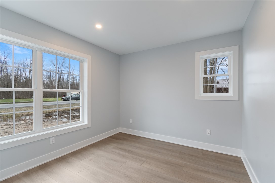 4034 Rasmussen Street Williamson, NY 14589 - Photo 17 of 27 Another bedroom in the front of the home - maybe a