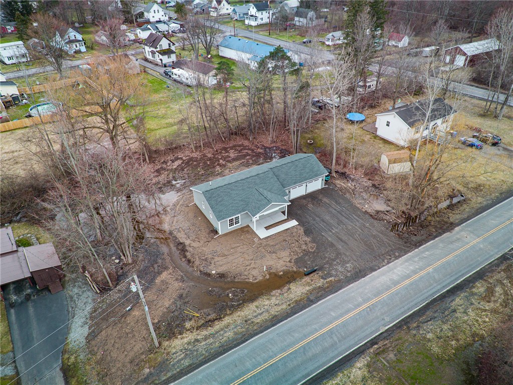 4034 Rasmussen Street Williamson, NY 14589 - Photo 20 of 27 The driveway has been prepped to be extra wide if