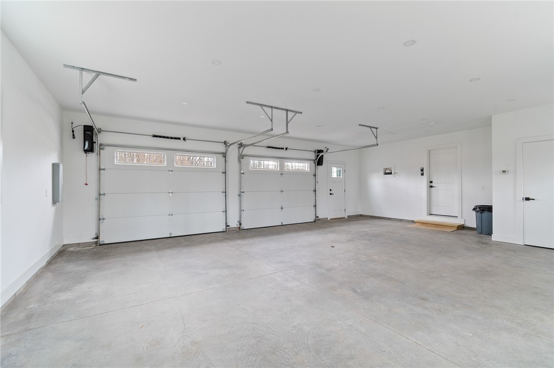 4034 Rasmussen Street Williamson, NY 14589 - Photo 23 of 27 The garage entrance- this home has HEATED FLOORS-