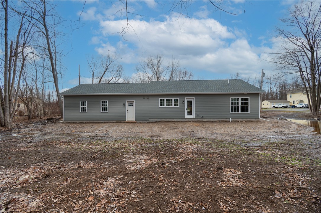 4034 Rasmussen Street Williamson, NY 14589 - Photo 26 of 27 The rear yard- SO MANY OPTIONS HERE!