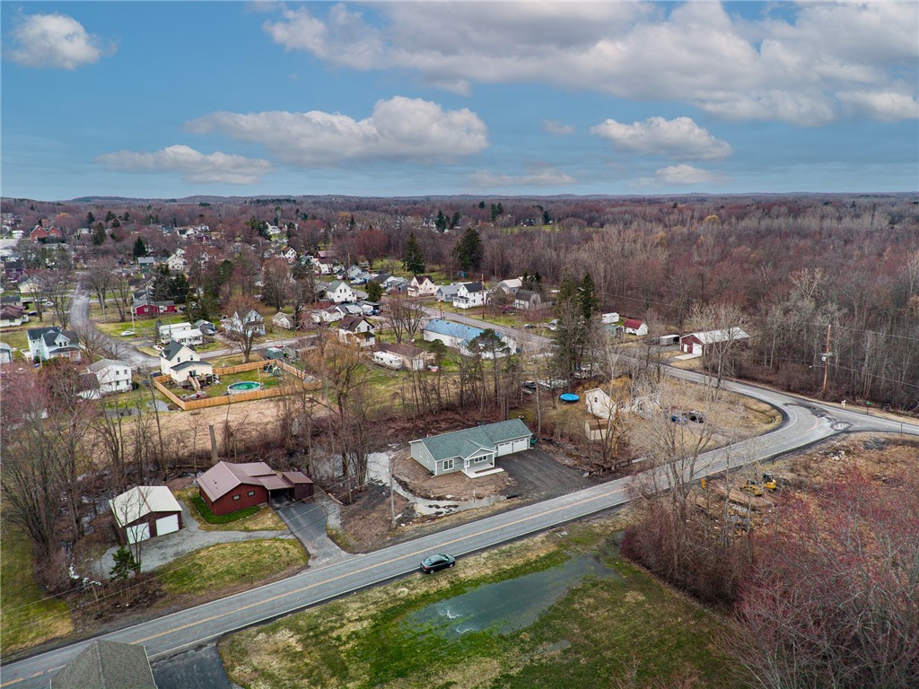 4034 Rasmussen Street Williamson, NY 14589 - Photo 3 of 27 The neighborhood at Rasmussen and Bennett streets!