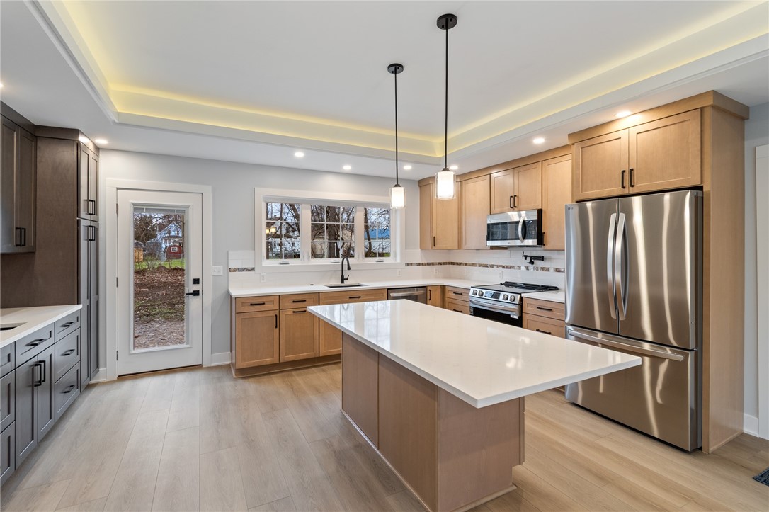 4034 Rasmussen Street Williamson, NY 14589 - Photo 4 of 27 This gorgeous kitchen has all the amenities you co