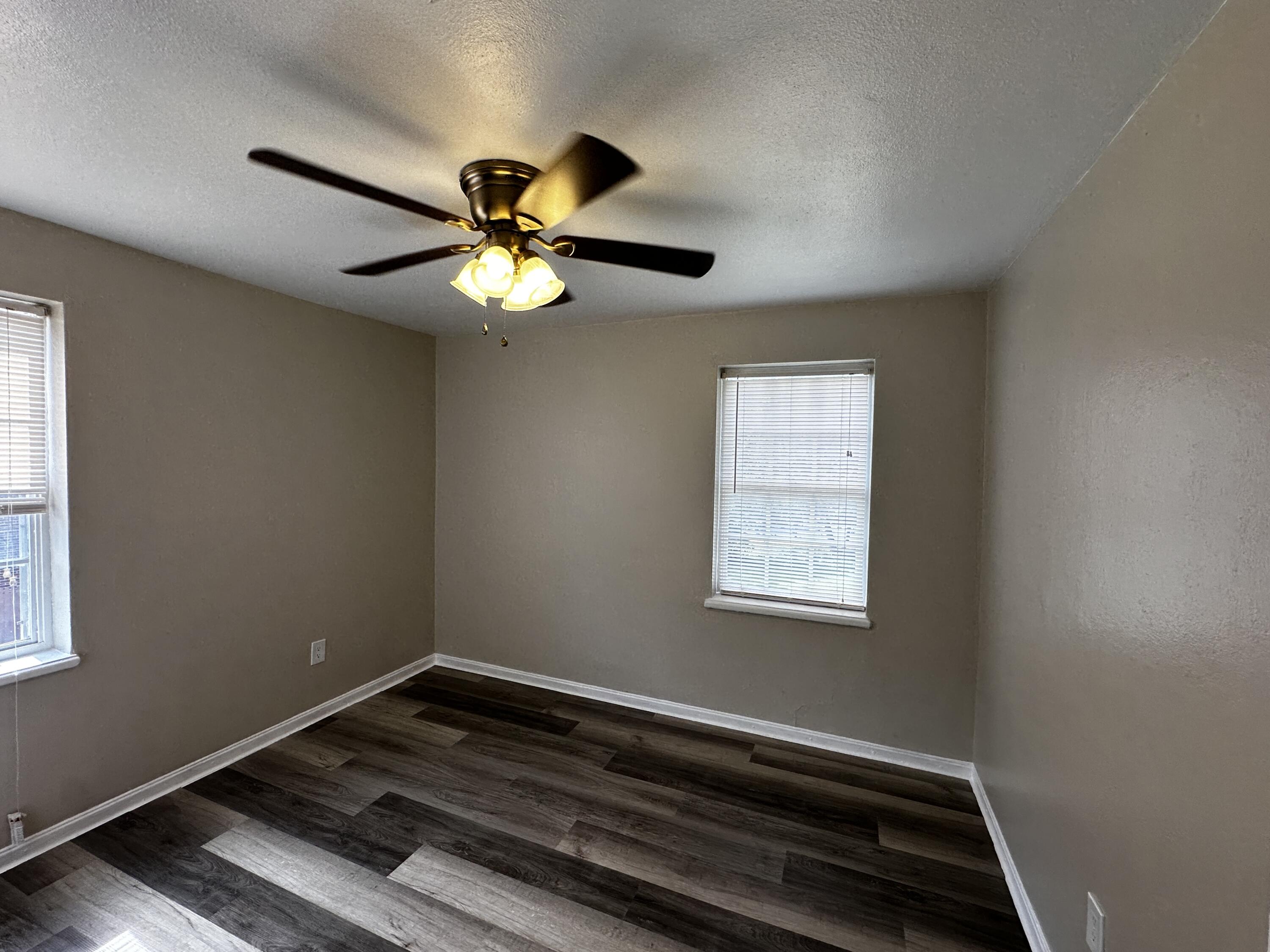 1728 Grandin Road Southwest, Unit 40 Roanoke, VA 24015 - Photo 7 of 9 a view of room with window and ceiling fan