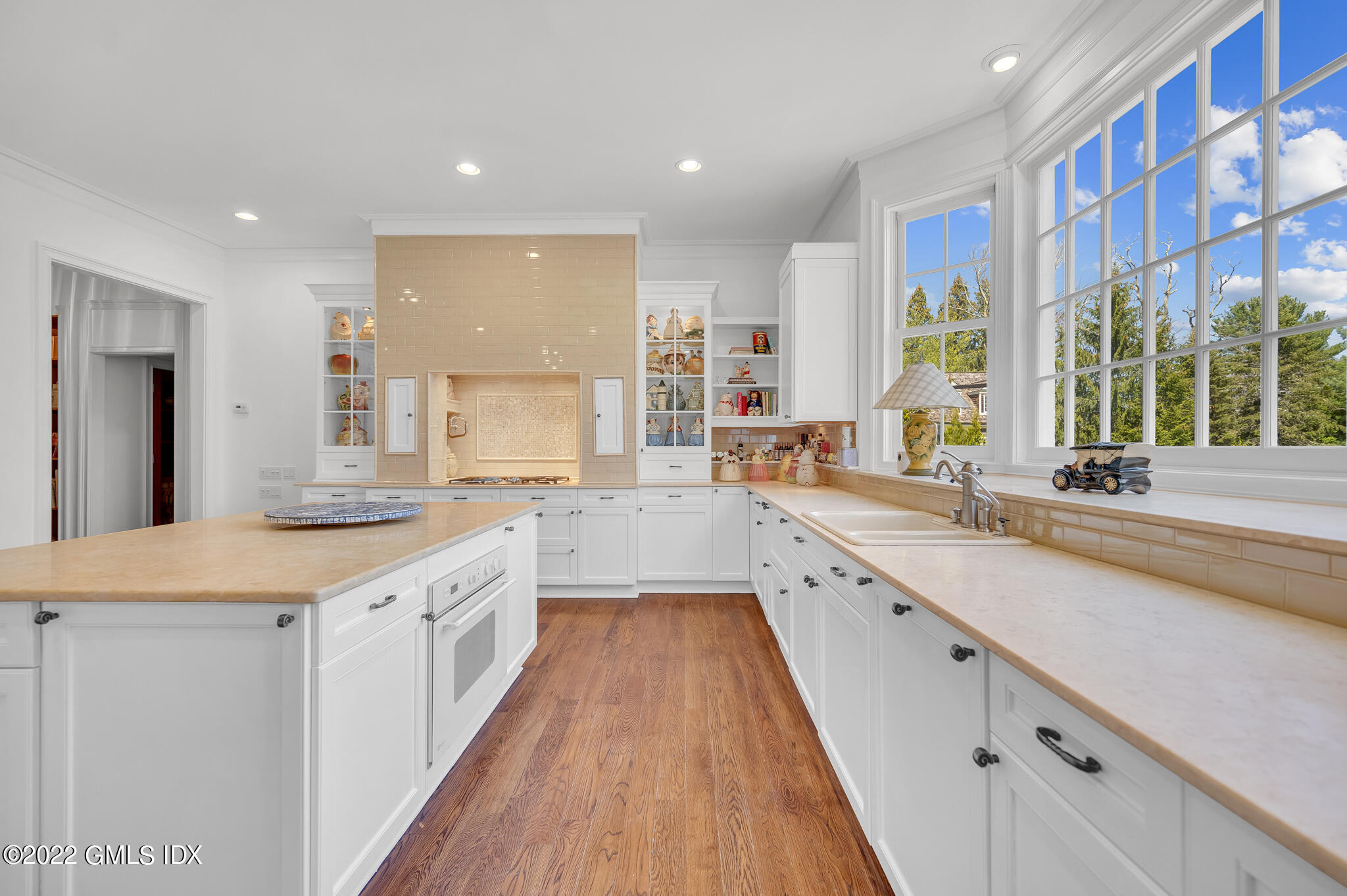 280 Round Hill Road Greenwich, CT 06831 - Photo 12 of 35 a large kitchen with stainless steel appliances a sink and cabinets