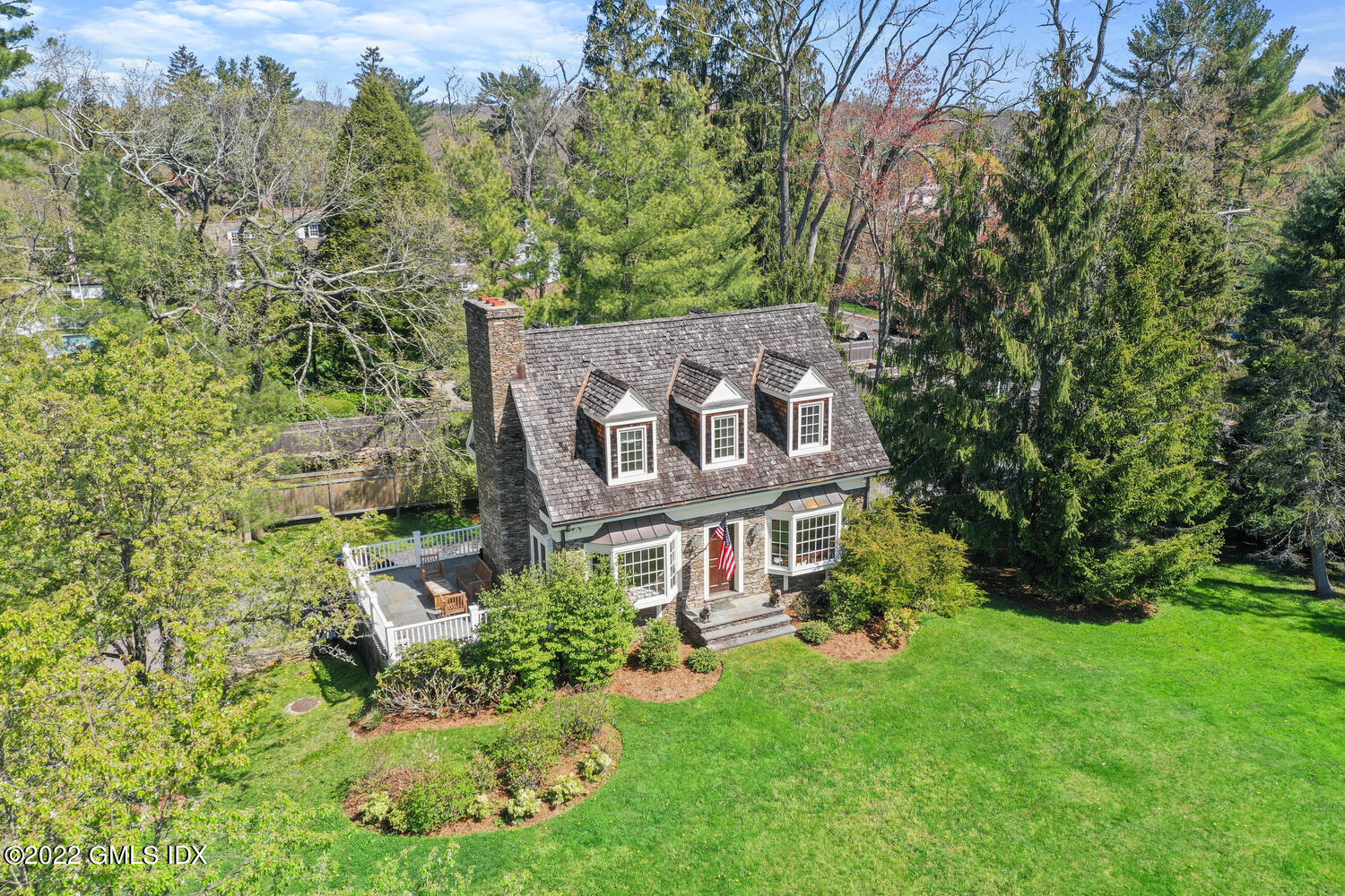 280 Round Hill Road Greenwich, CT 06831 - Photo 27 of 35 front view of a house with a yard