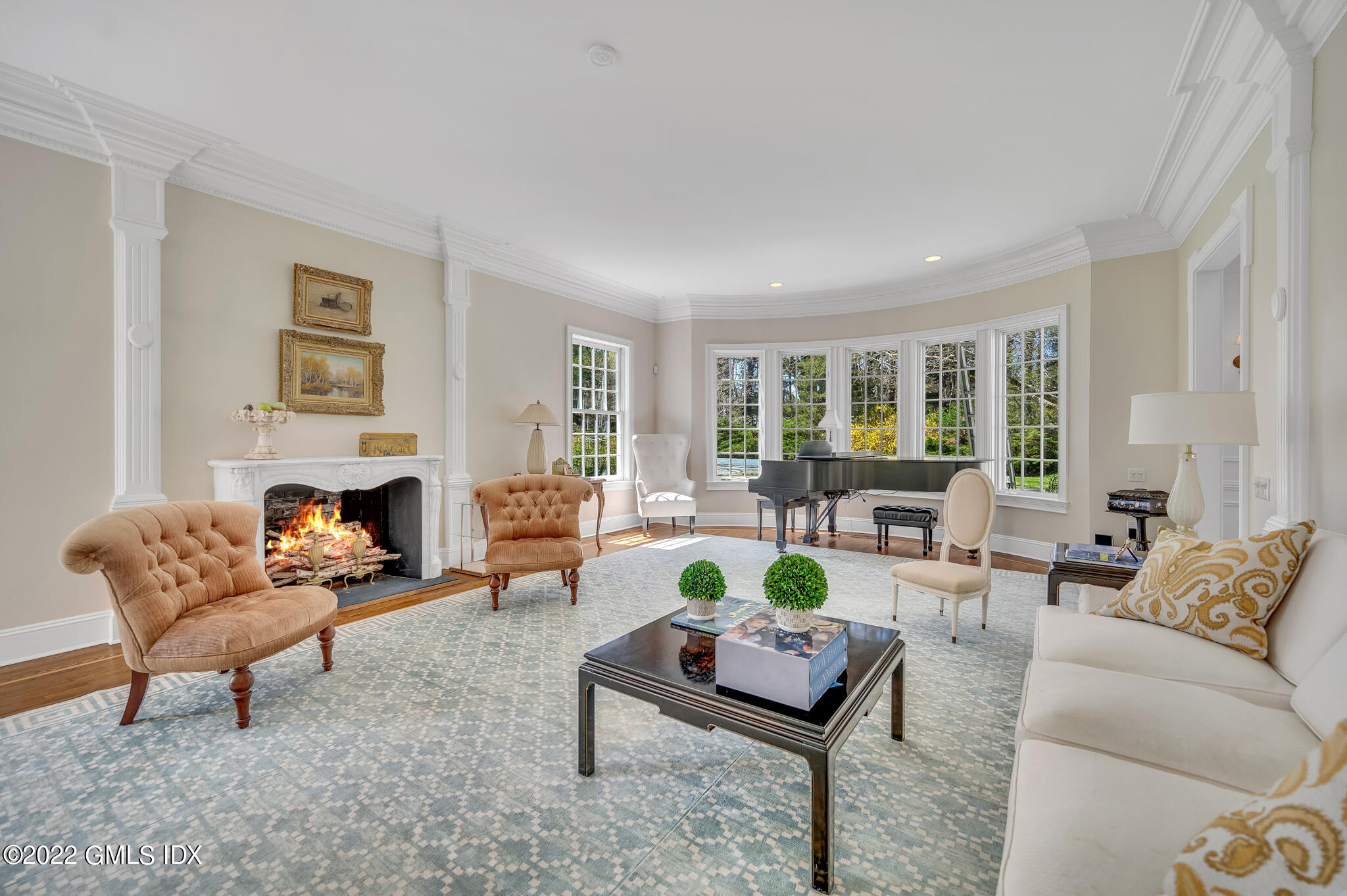280 Round Hill Road Greenwich, CT 06831 - Photo 7 of 35 a living room with furniture and a fireplace