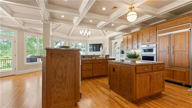 a view of balcony with wooden floor