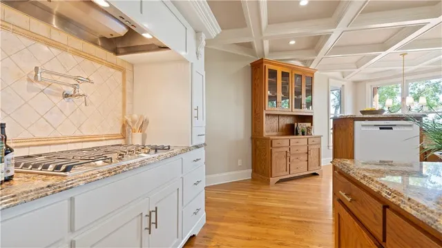 a view of balcony with wooden floor and fence