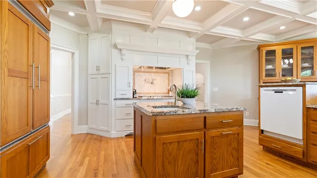 a view of an empty room and glass door