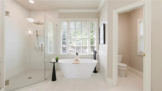 a view of a house with yard and sitting area