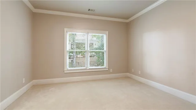 a view of a balcony with wooden floor