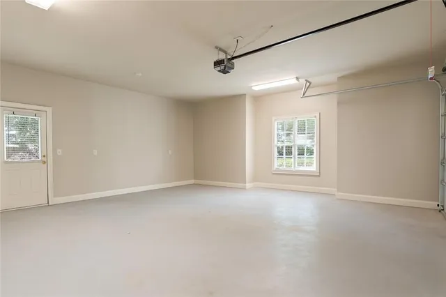 a view of a garden with a large tree