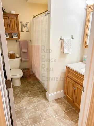 a bathroom with a sink and a shower