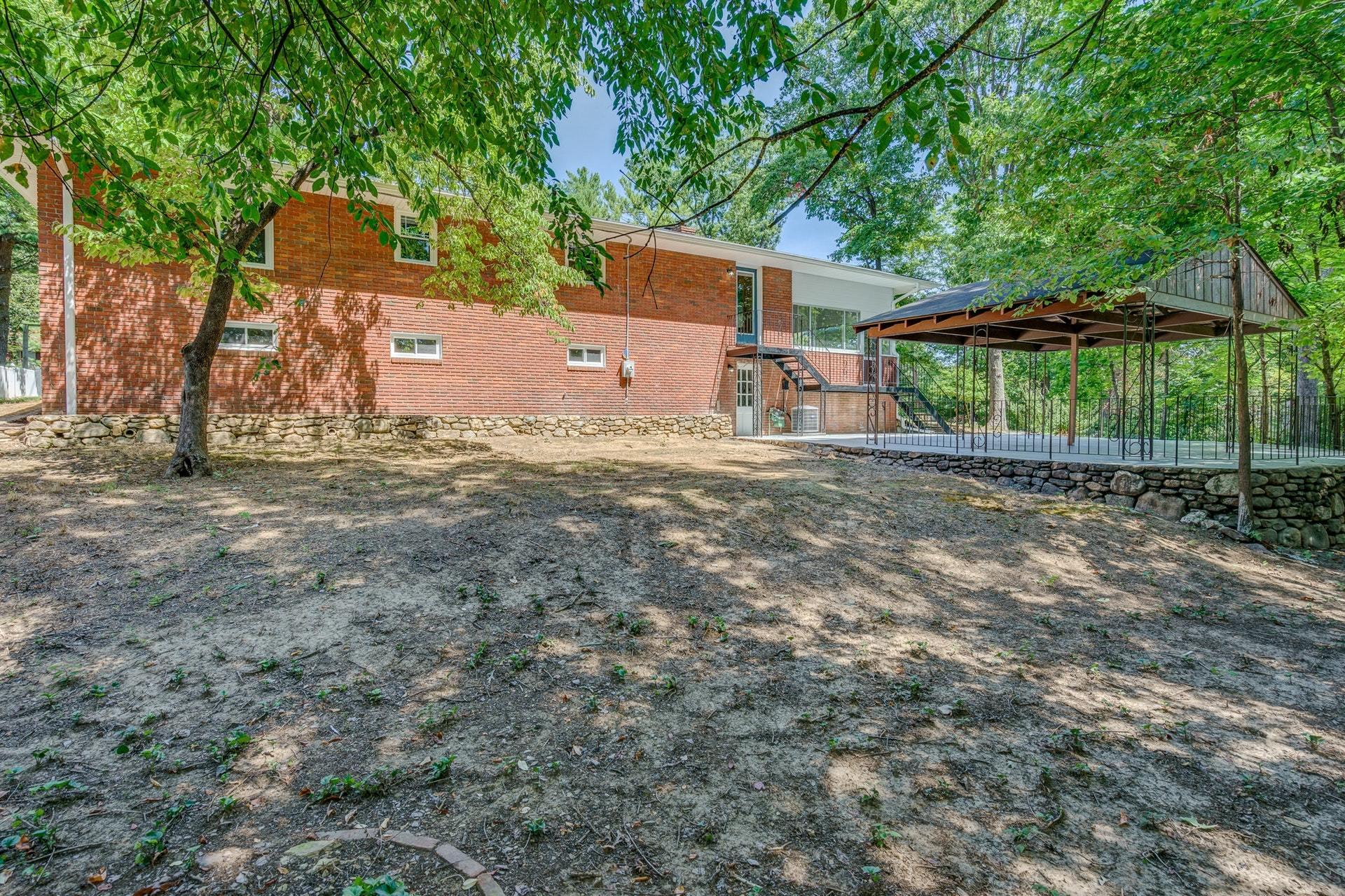 3585 Forester Road Southwest Roanoke, VA 24018 - Photo 35 of 38 front view of a house with a yard