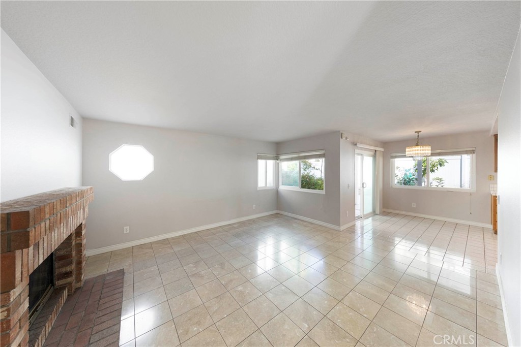 2 Bernini Irvine, CA 92614 - Photo 11 of 30 Family room easily pours into breakfast area, kitchen, and easily accessible to backyard.