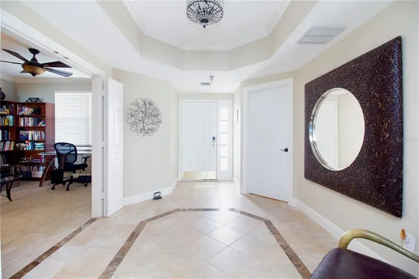 a view of a livingroom with furniture and closet