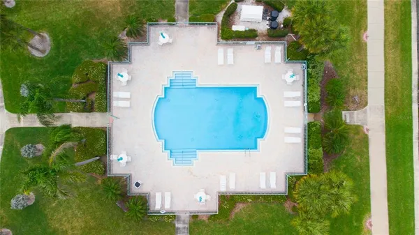a view of yard with swimming pool
